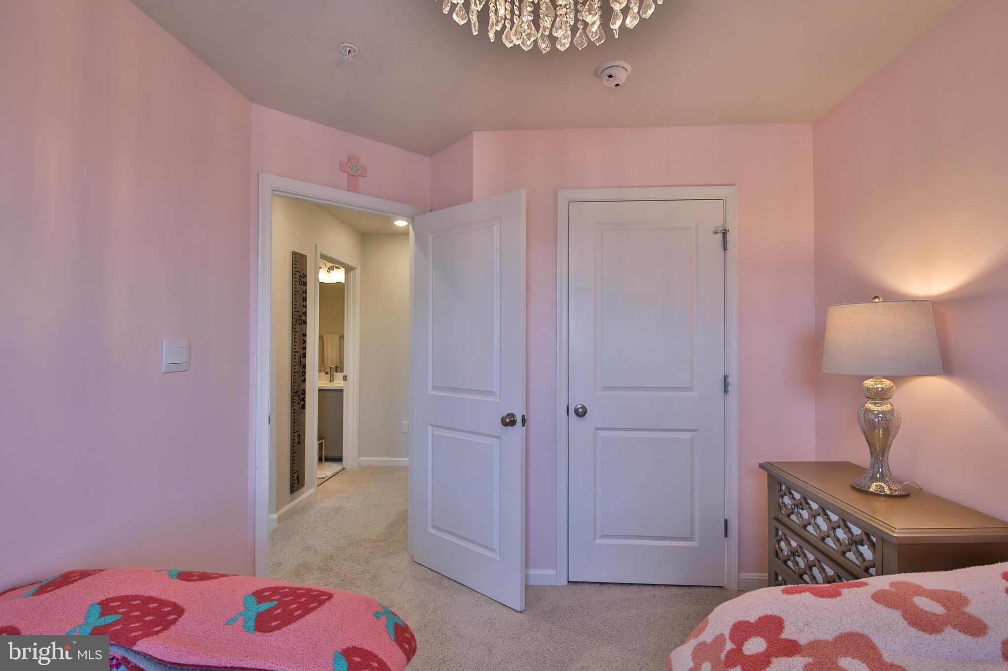 5059 Silver Oak Drive Rosedale, MD 21237 - Photo 20 of 43 a bedroom with a bed and a dresser