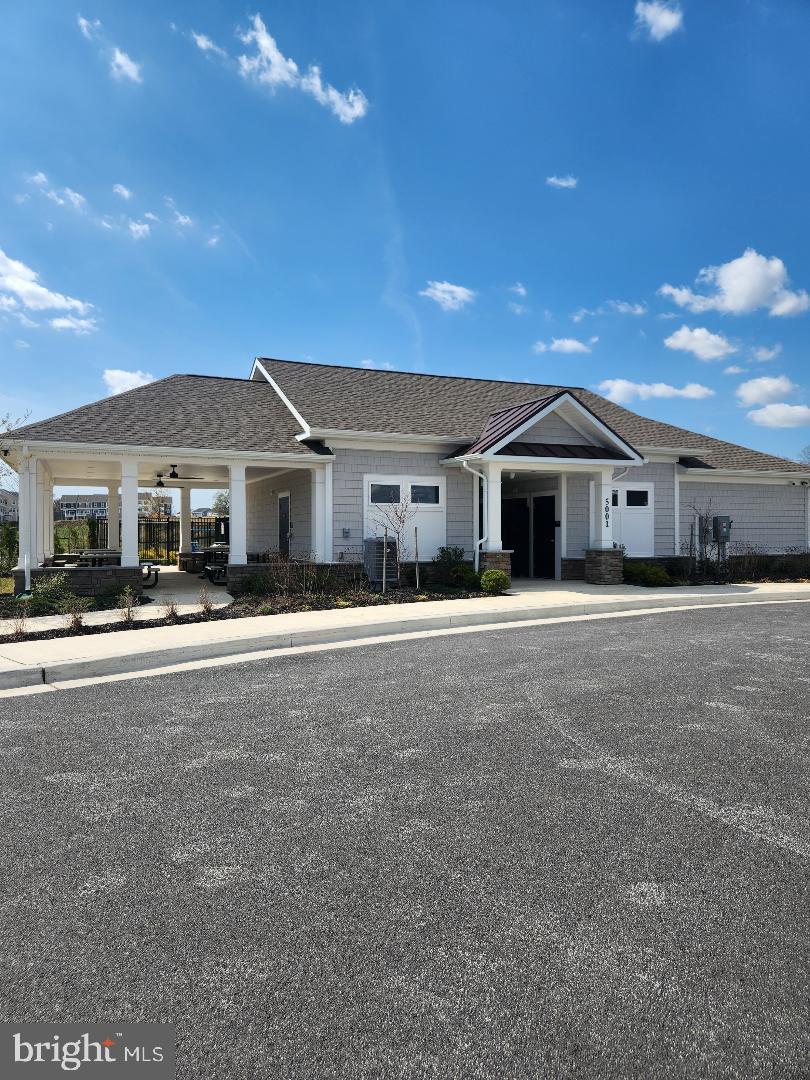 5059 Silver Oak Drive Rosedale, MD 21237 - Photo 41 of 43 a front view of a house with a yard