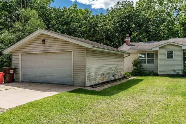 a view of a backyard of the house