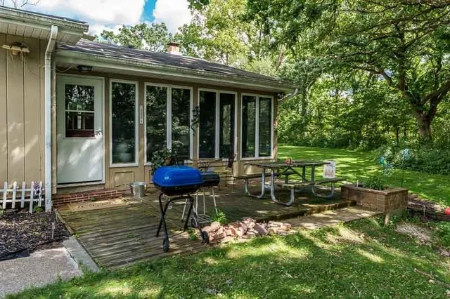 a garden view with a seating space