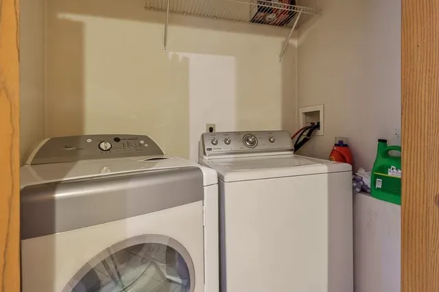 a kitchen with stainless steel appliances a refrigerator stove and sink