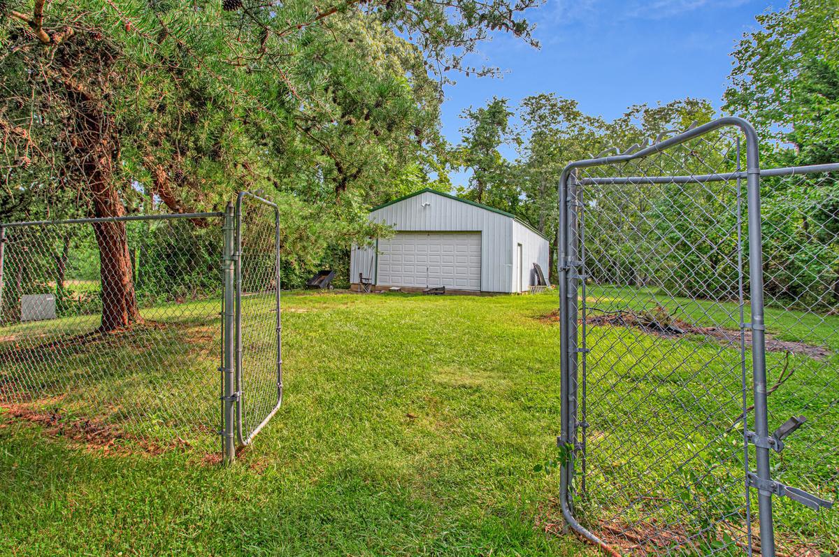 8070 Nursery Road Lusby, MD 20657 - Photo 6 of 47 2 car detached garage/workshop w/ 8' door.