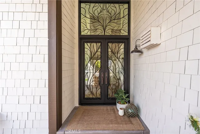 a view of a entryway door front of a house