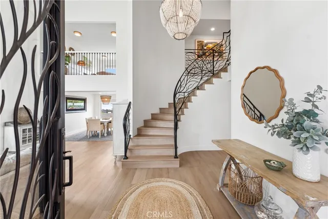 a view of hall way with furniture