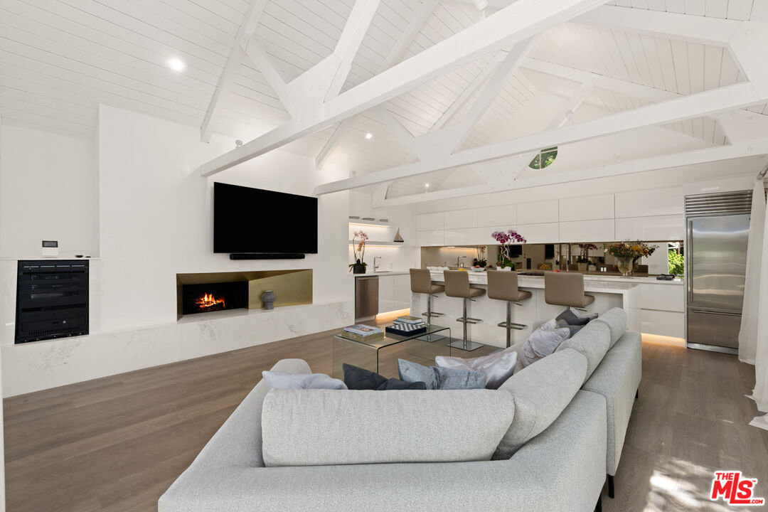 5949 Ramirez Canyon Road Malibu, CA 90265 - Photo 1 of 26 a living room with furniture and a flat screen tv