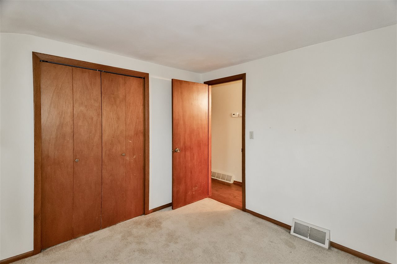 118 North Elizabeth Scales Mound Road Elizabeth, IL 61028 - Photo 22 of 40 a view of an empty room and closet area