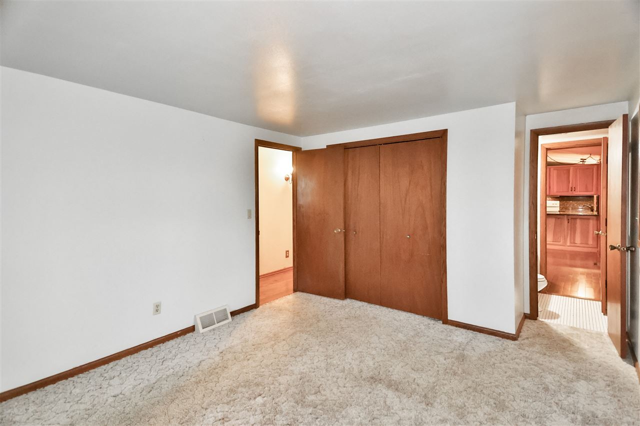 118 North Elizabeth Scales Mound Road Elizabeth, IL 61028 - Photo 26 of 40 a view of an empty room and closet area