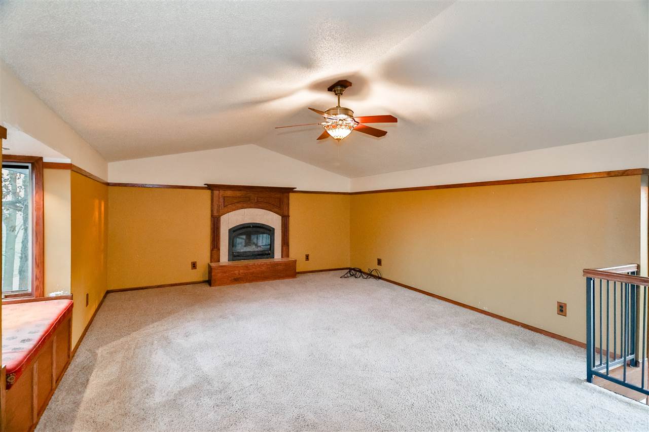 118 North Elizabeth Scales Mound Road Elizabeth, IL 61028 - Photo 6 of 40 a view of empty room with fireplace