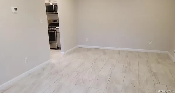 a white refrigerator freezer sitting in a kitchen