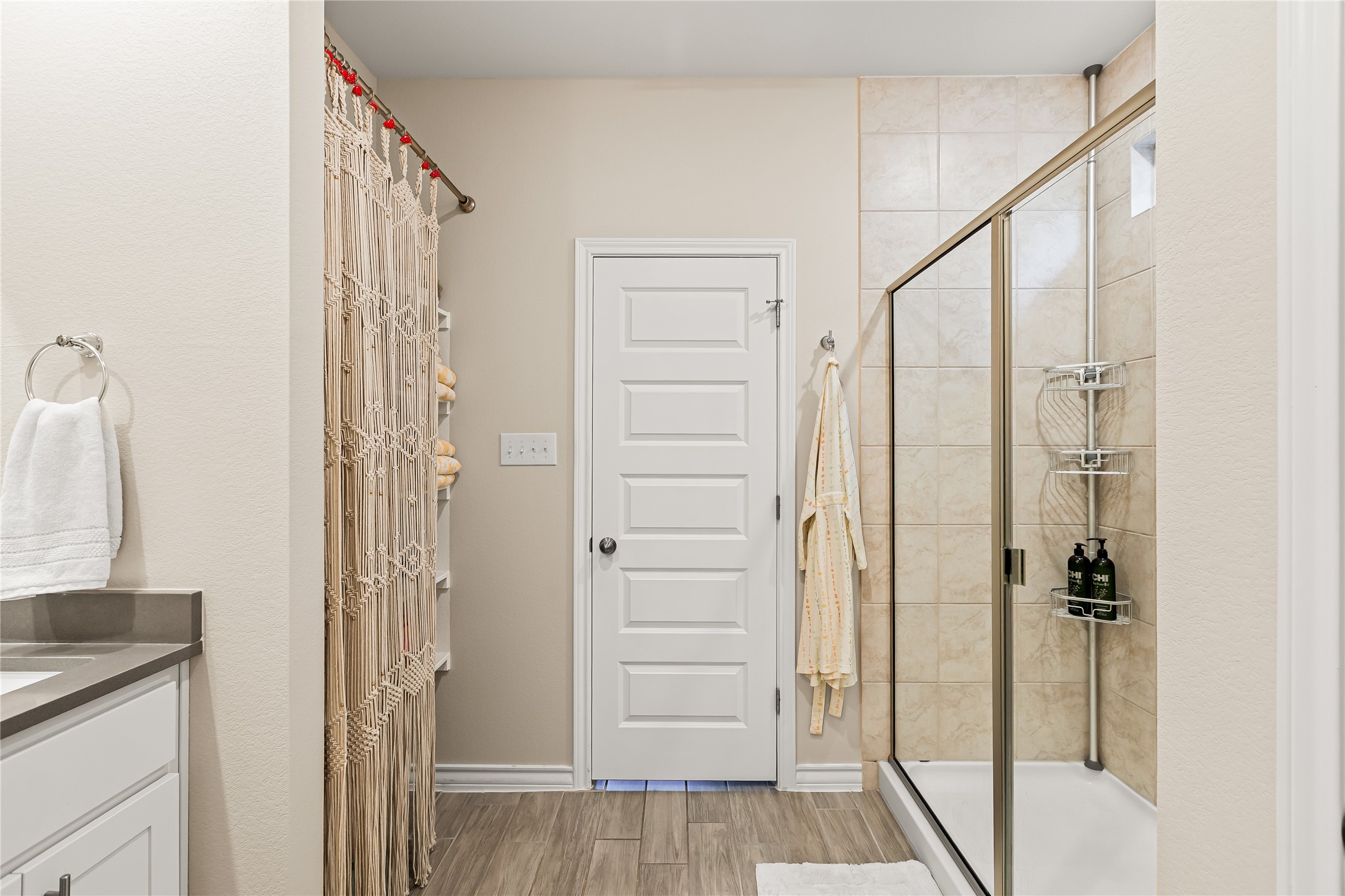 862 Pepperbark Loop Buda, TX 78610 - Photo 19 of 40 a bathroom with a shower and a glass door