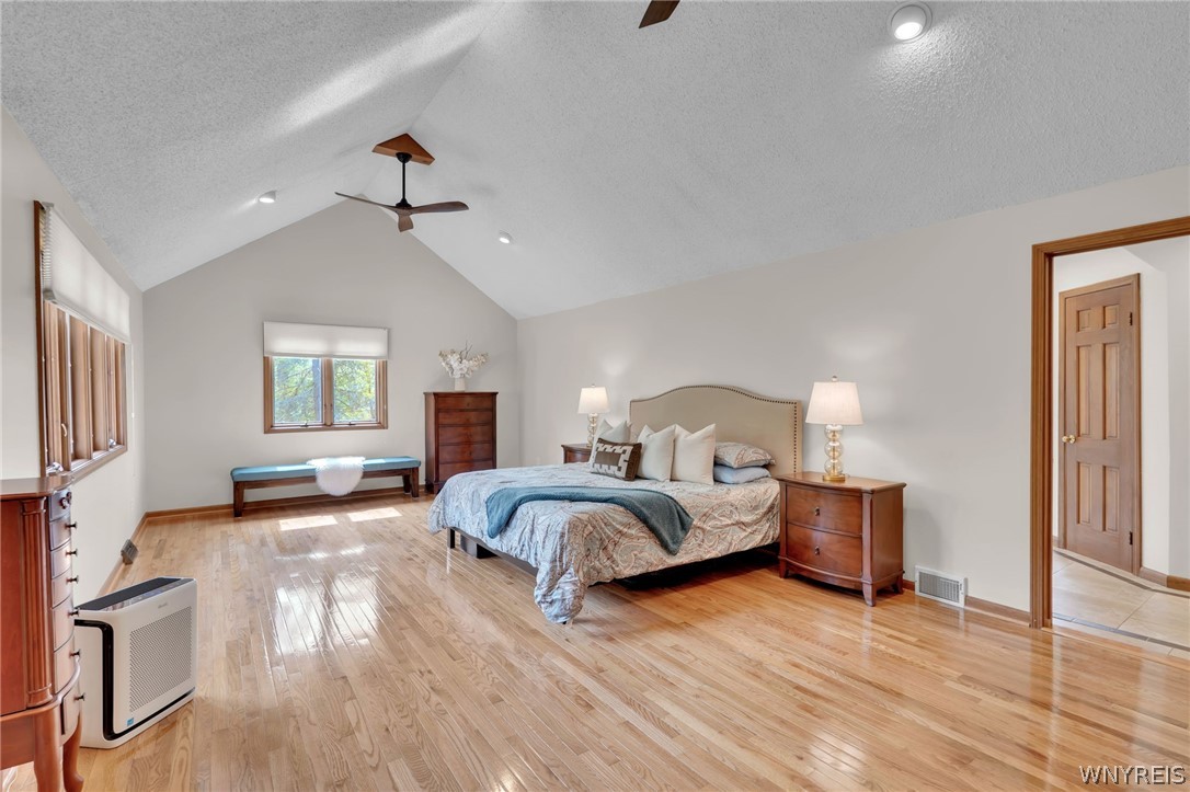 4789 Shimerville Road Clarence, NY 14031 - Photo 28 of 50 Primary en-suite w gas fireplace