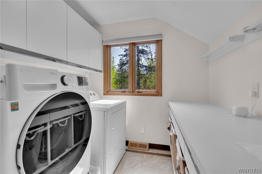 4789 Shimerville Road Clarence, NY 14031 - Photo 32 of 50 2nd floor laundry