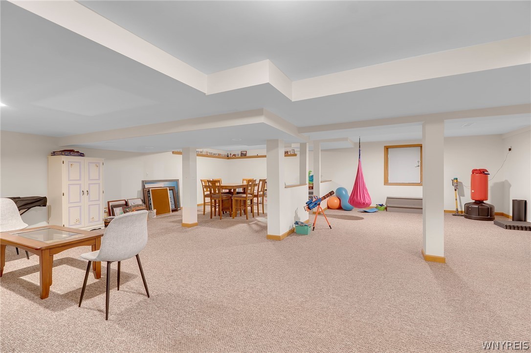 4789 Shimerville Road Clarence, NY 14031 - Photo 38 of 50 Finished basement w egress