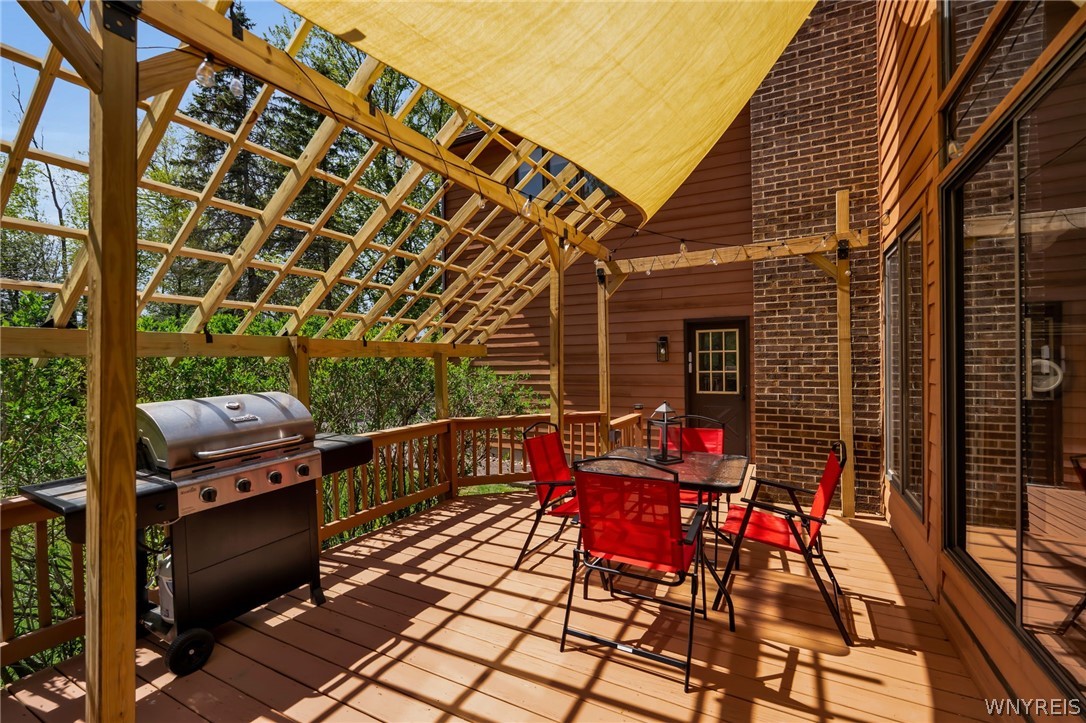 4789 Shimerville Road Clarence, NY 14031 - Photo 40 of 50 Pergola off of sunroom