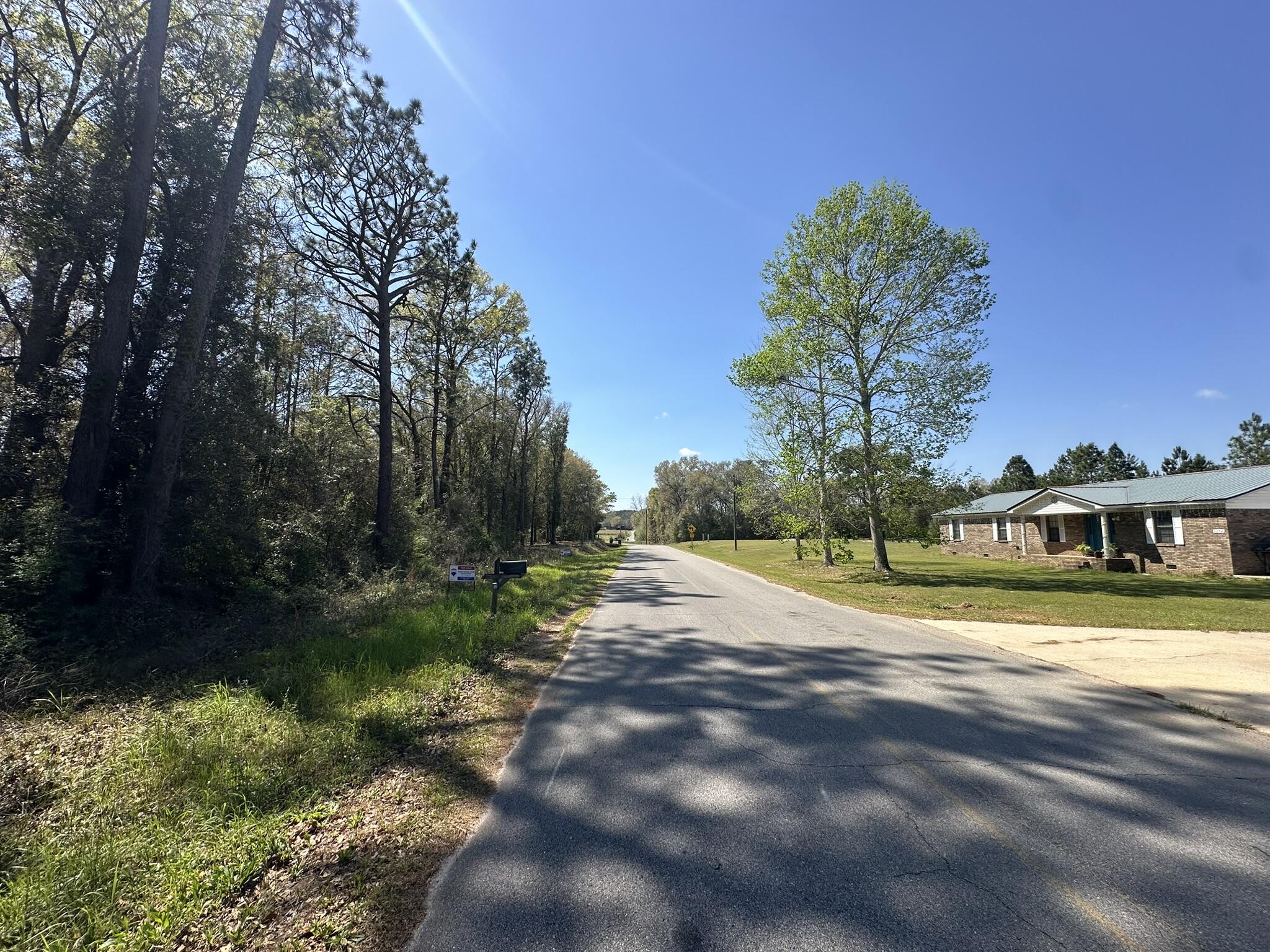 Parcel B Holloway Road Baker, FL 32531 - Photo 8 of 8 a view of street with houses in background