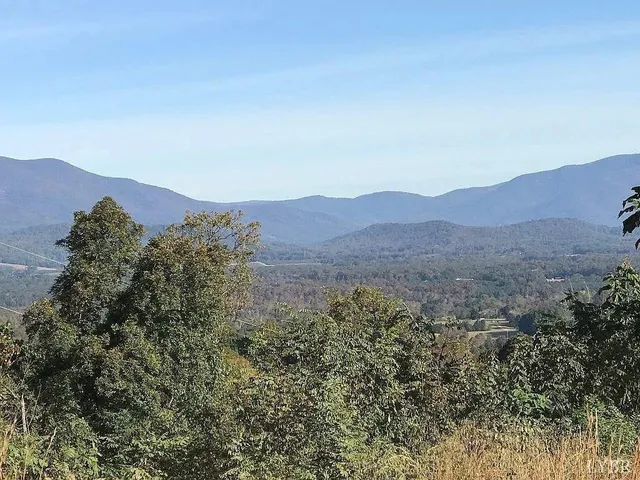 a view of mountains and valleys