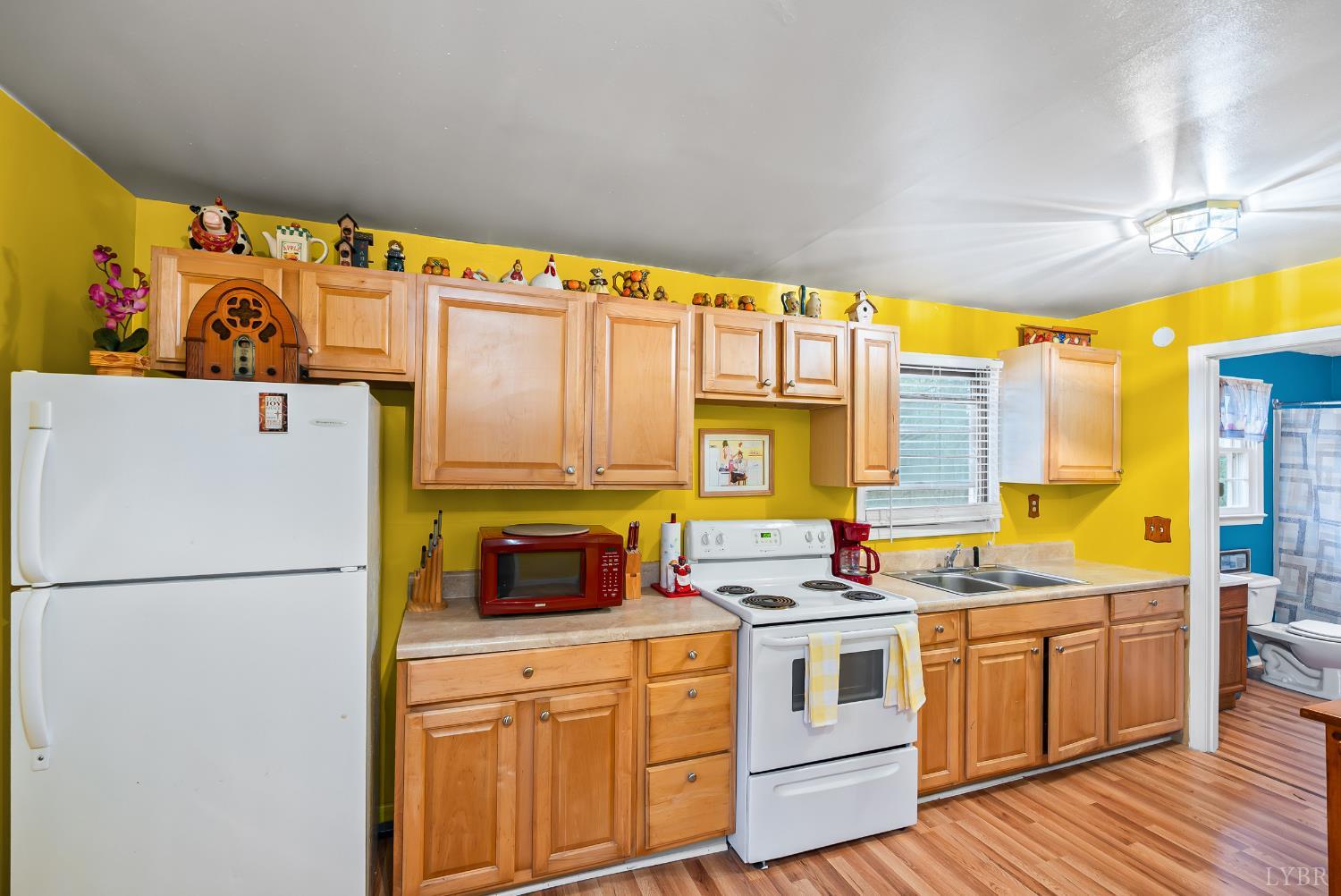 26 Braddock Lane Shipman, VA 22971 - Photo 12 of 37 a kitchen with stainless steel appliances a stove a sink and a refrigerator