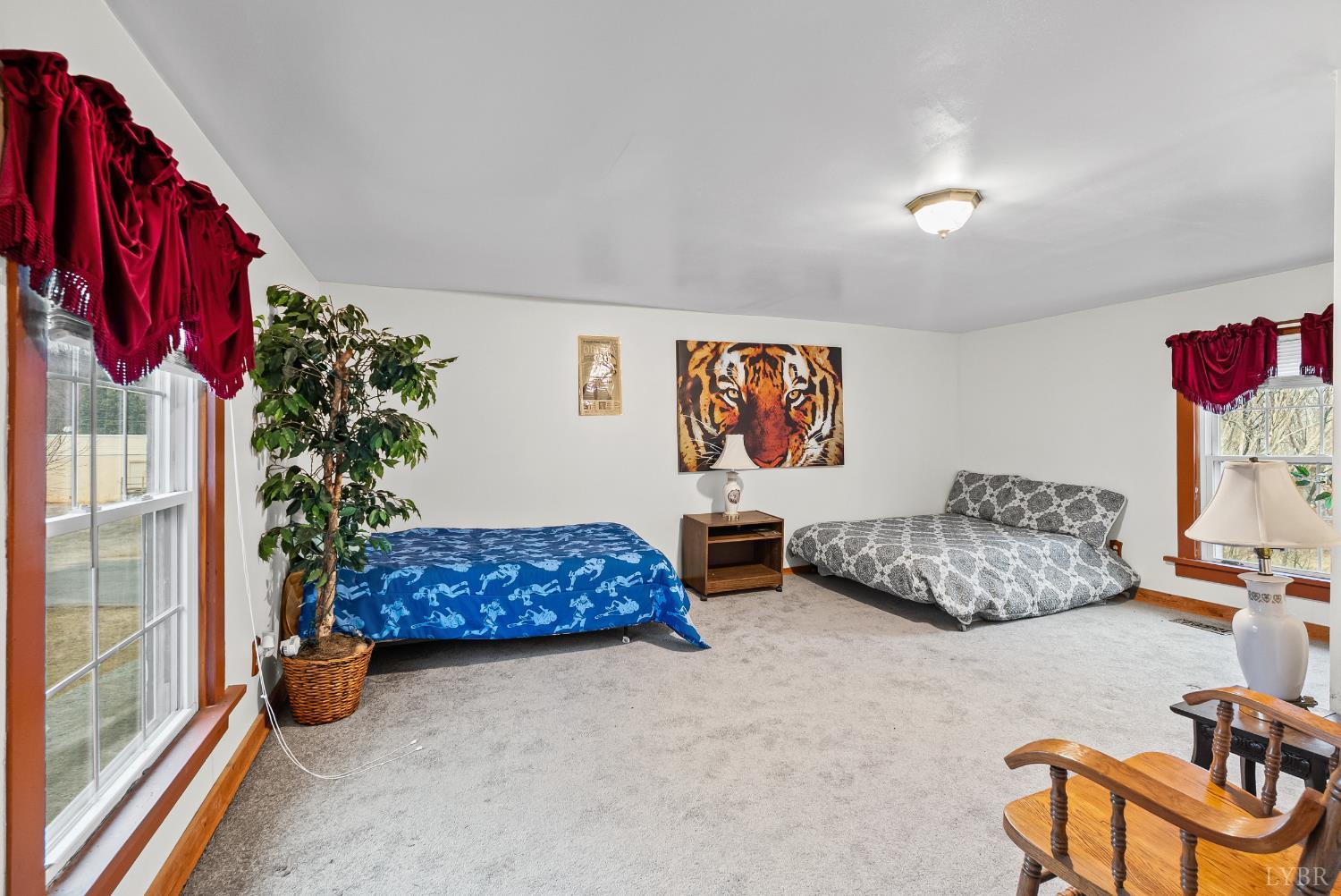 26 Braddock Lane Shipman, VA 22971 - Photo 19 of 37 a living room with furniture and a potted plant