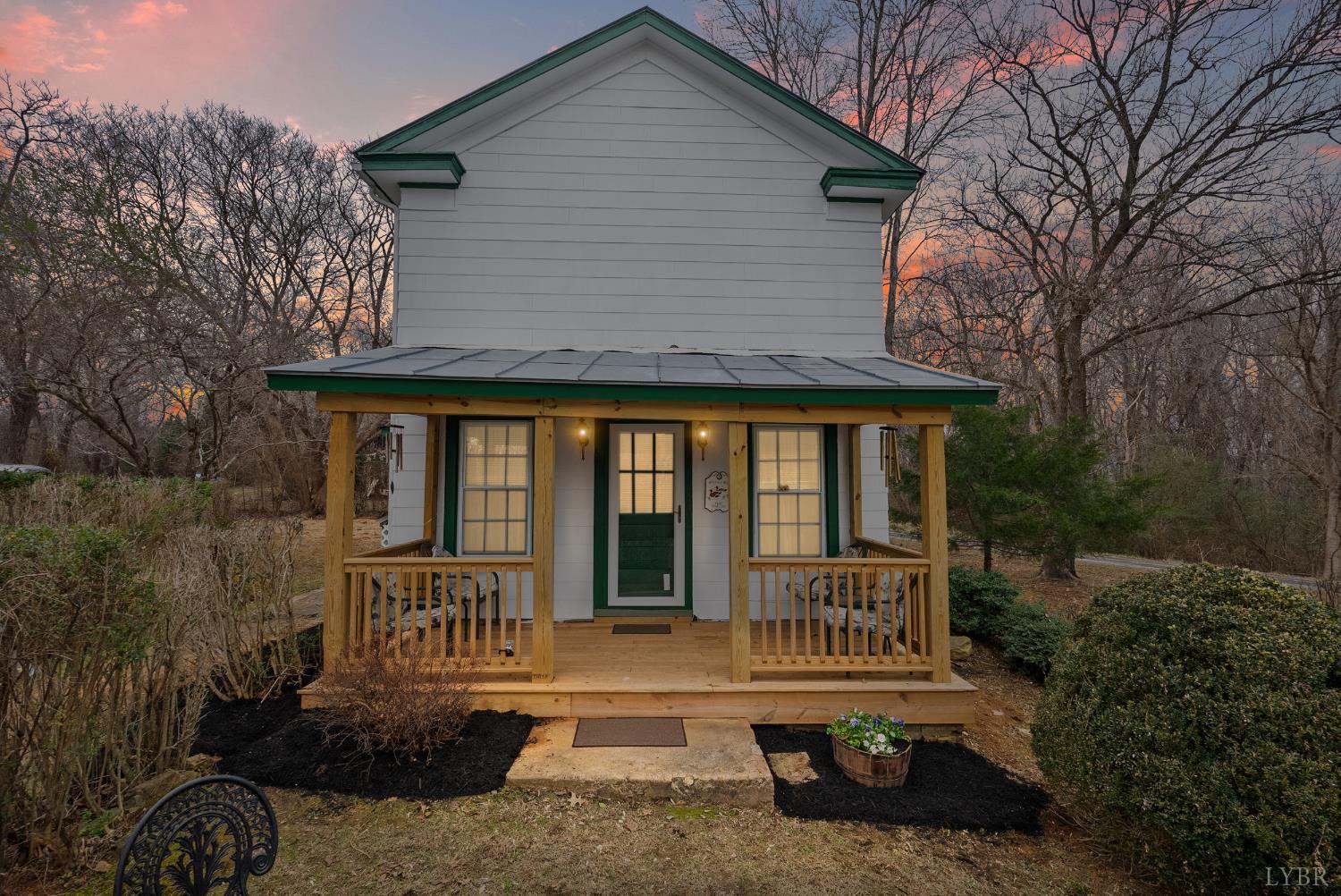 26 Braddock Lane Shipman, VA 22971 - Photo 2 of 37 a view of a house with backyard and porch