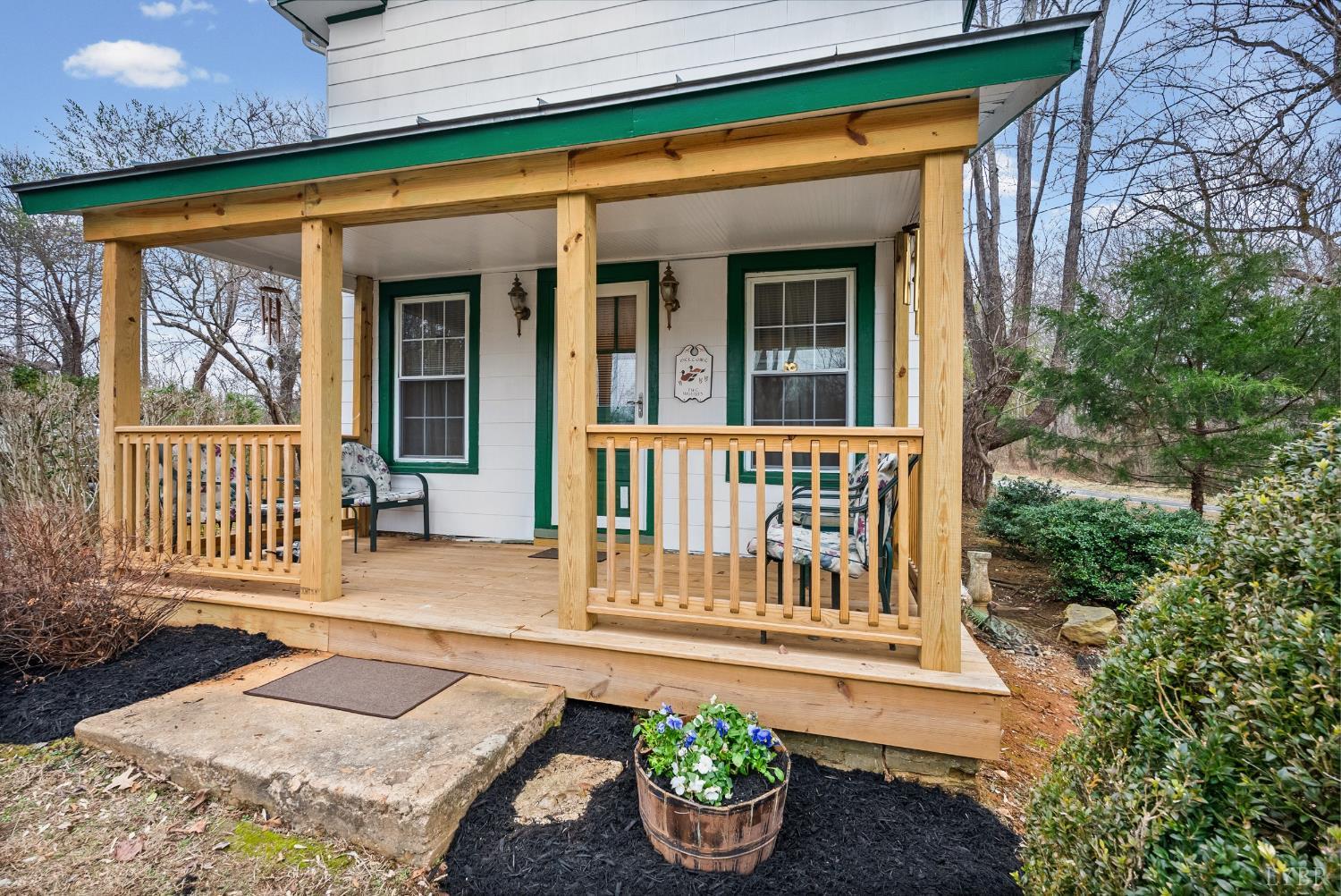 26 Braddock Lane Shipman, VA 22971 - Photo 3 of 37 a front view of a house with a porch