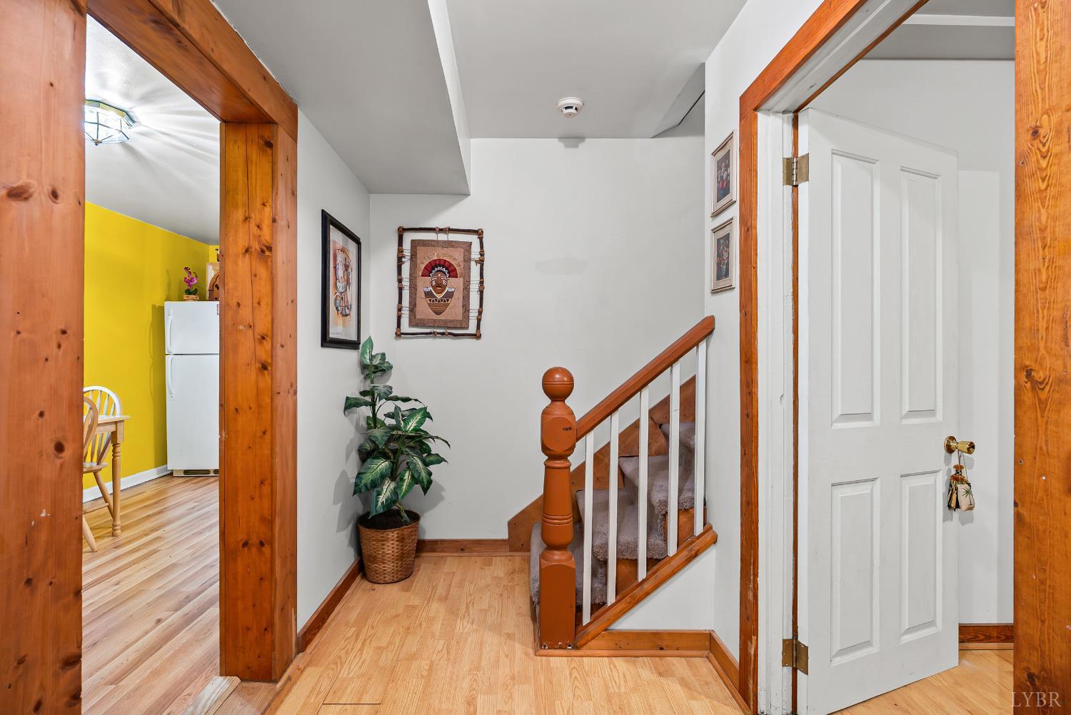 26 Braddock Lane Shipman, VA 22971 - Photo 7 of 37 a view of a hallway with wooden floor and staircase