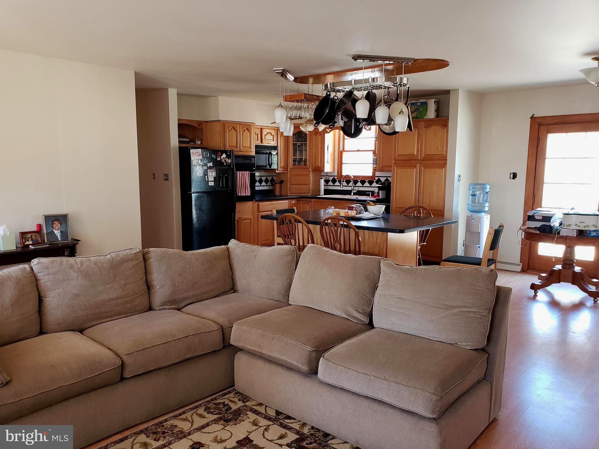 15605 Letcher Road Brandywine, MD 20613 - Photo 3 of 33 LIVING ROOM/ KITCHEN