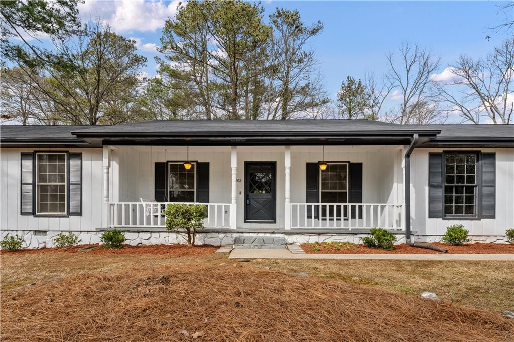 1202 Lafayette Drive Southwest Mableton, GA 30126 - Photo 1 of 1 front view of a house with a yard