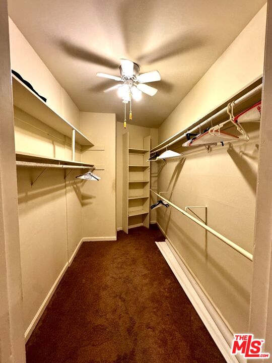 8455 Fountain Avenue, Unit 412 West Hollywood, CA 90069 - Photo 15 of 21 a view of a room with racks on the wall