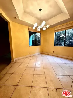 a view of a room with a chandelier