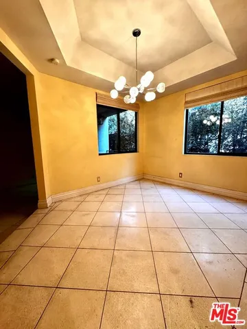 a view of a room with a chandelier