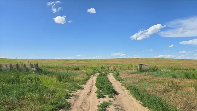 a view of a city and mountains in the background