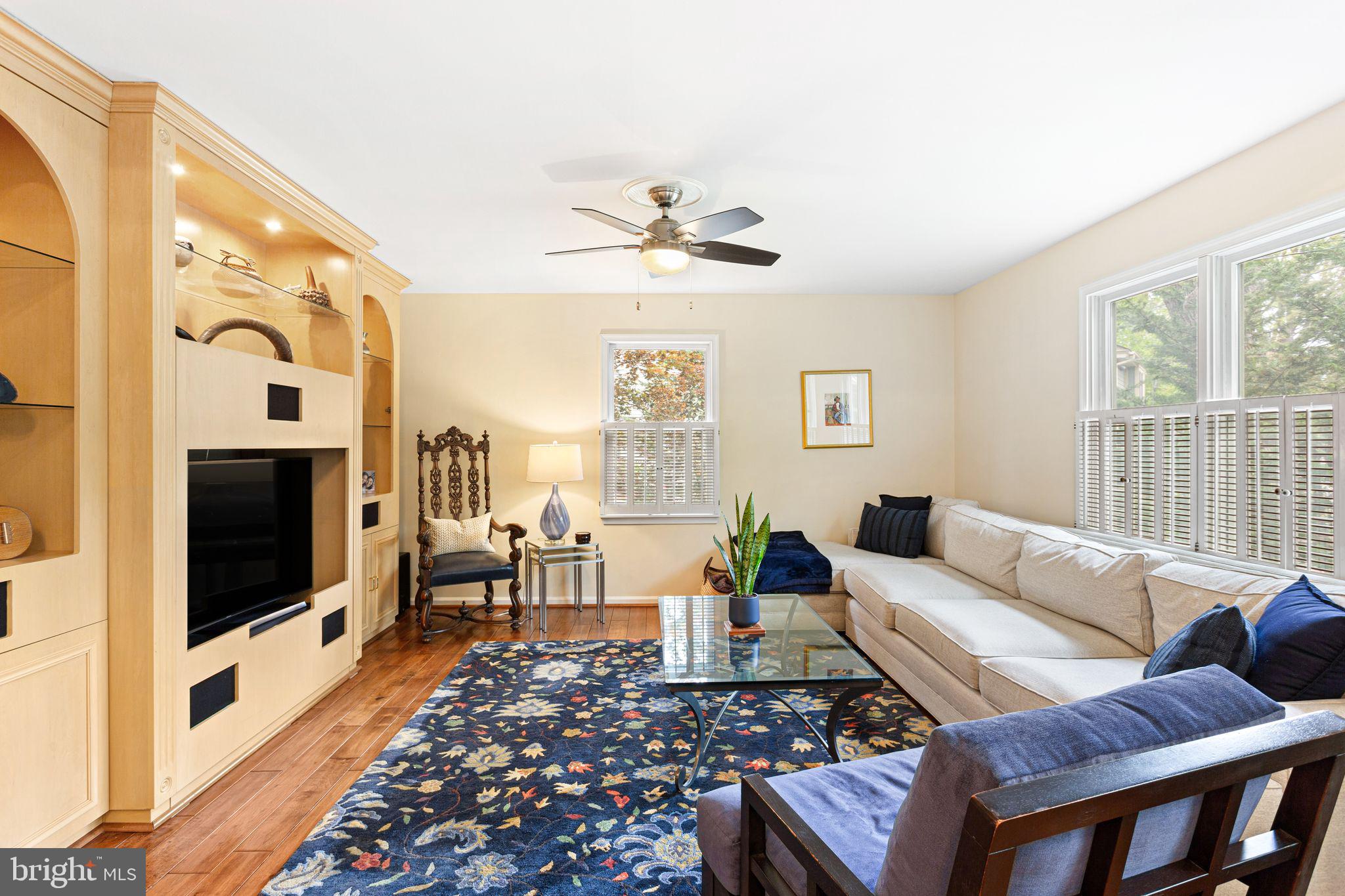 51 Chestnut Street Haddonfield, NJ 08033 - Photo 12 of 56 a living room with furniture a flat screen tv and a fireplace
