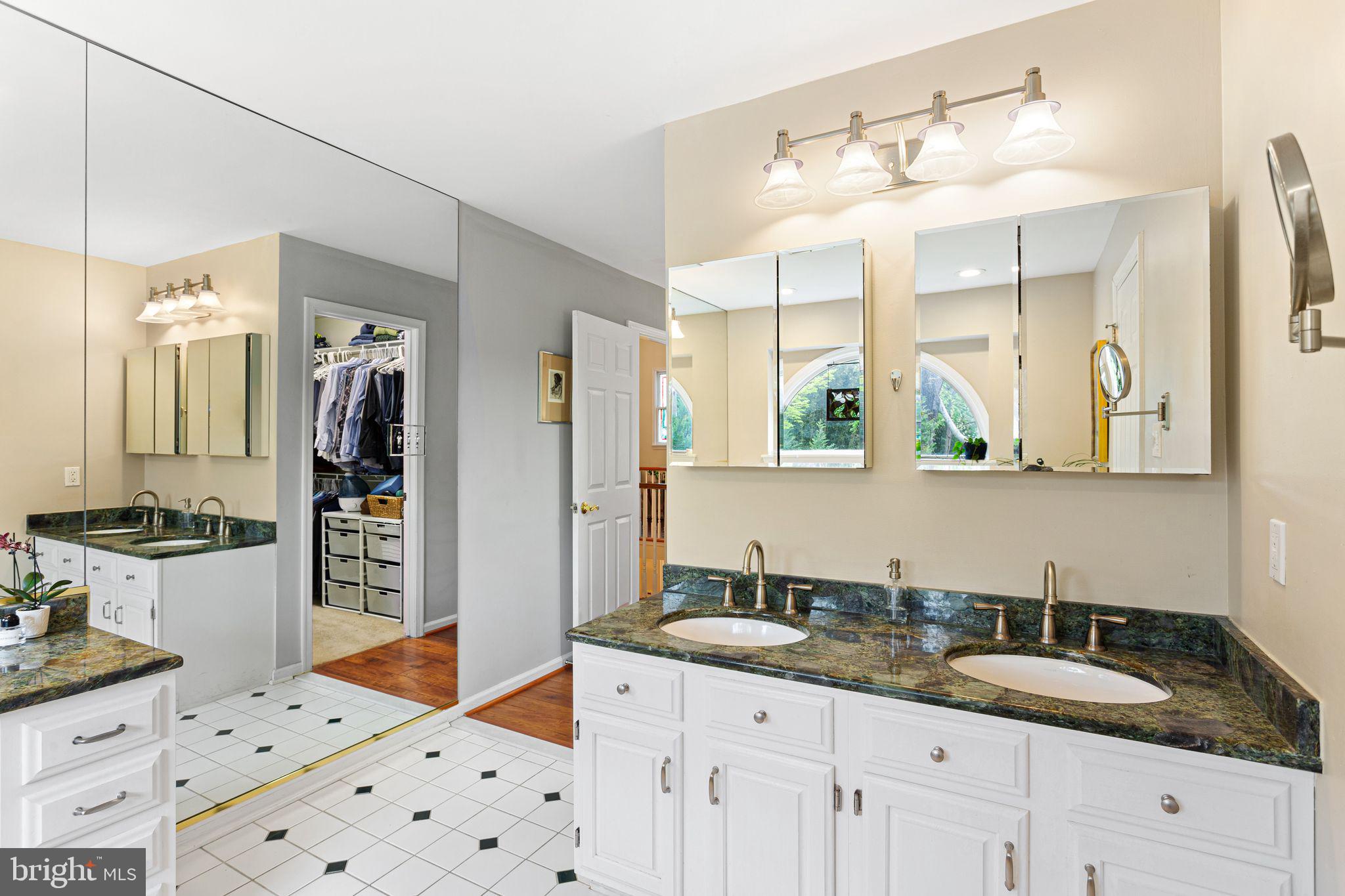 51 Chestnut Street Haddonfield, NJ 08033 - Photo 29 of 56 a spacious bathroom with a sink double vanity and a mirror