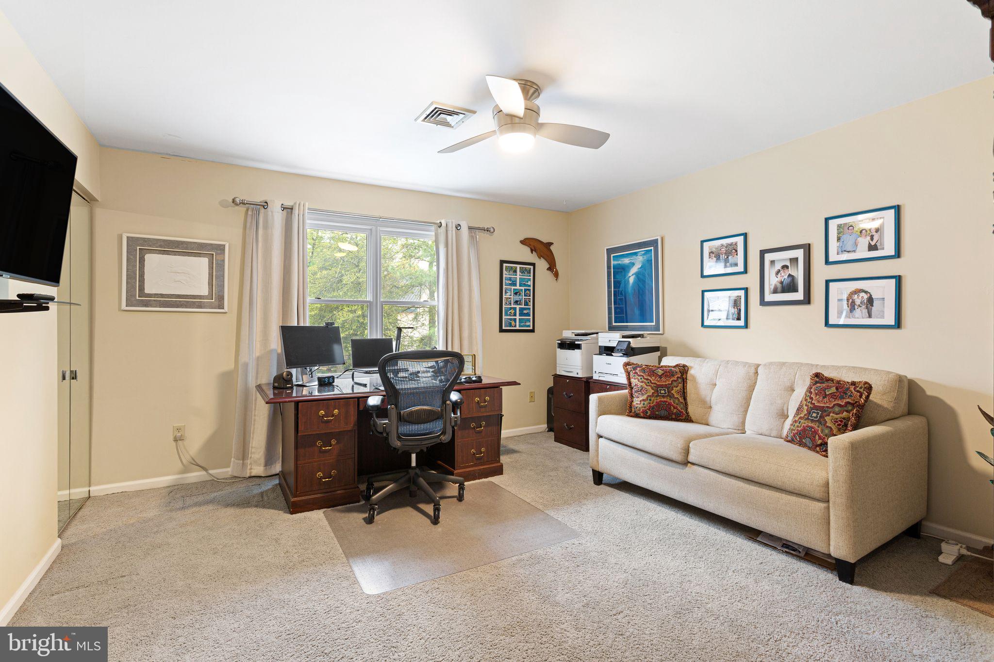 51 Chestnut Street Haddonfield, NJ 08033 - Photo 32 of 56 a view of a livingroom with workspace and a couch