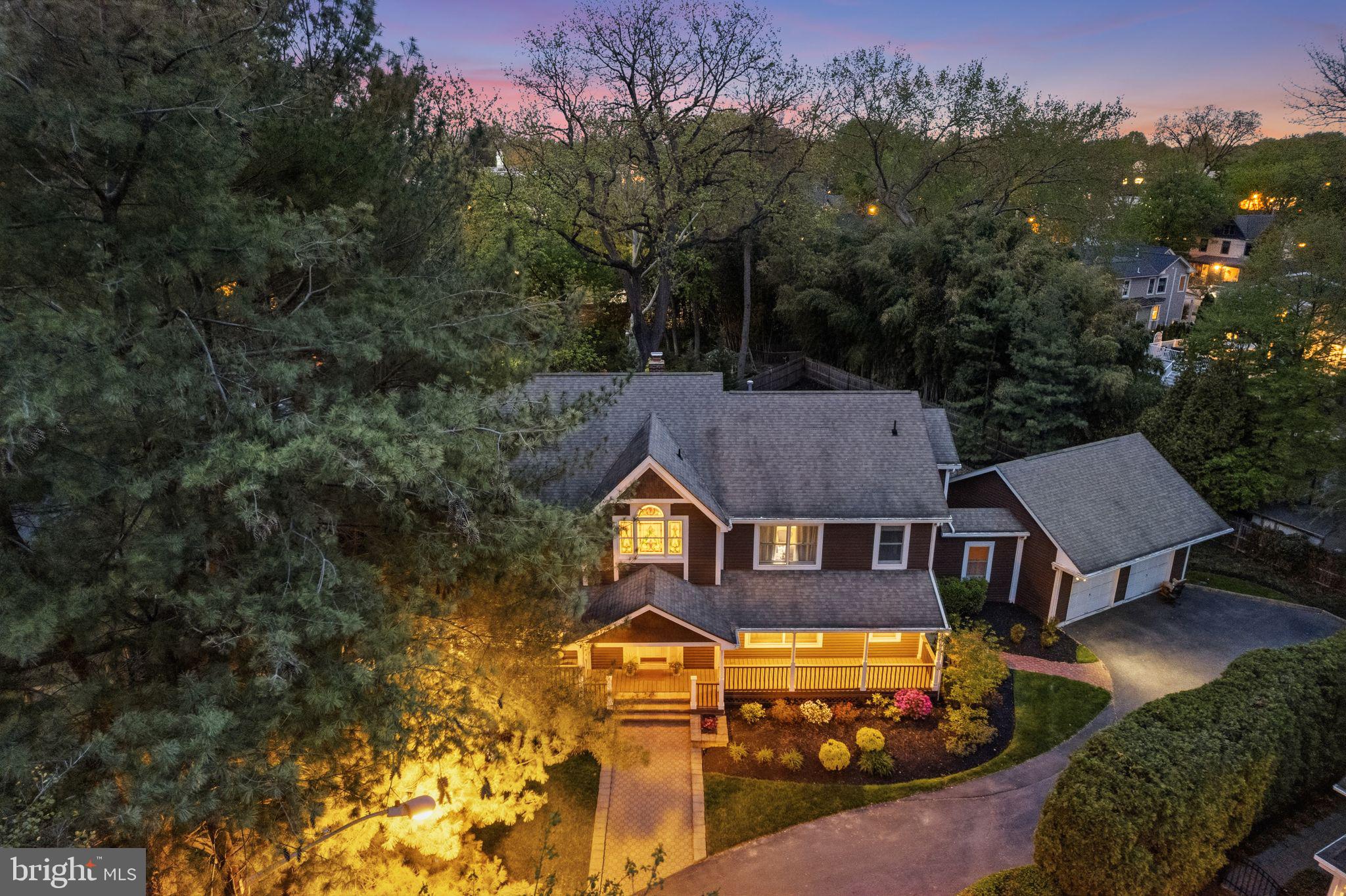 51 Chestnut Street Haddonfield, NJ 08033 - Photo 4 of 56 an aerial view of a house with swimming pool and mountain view