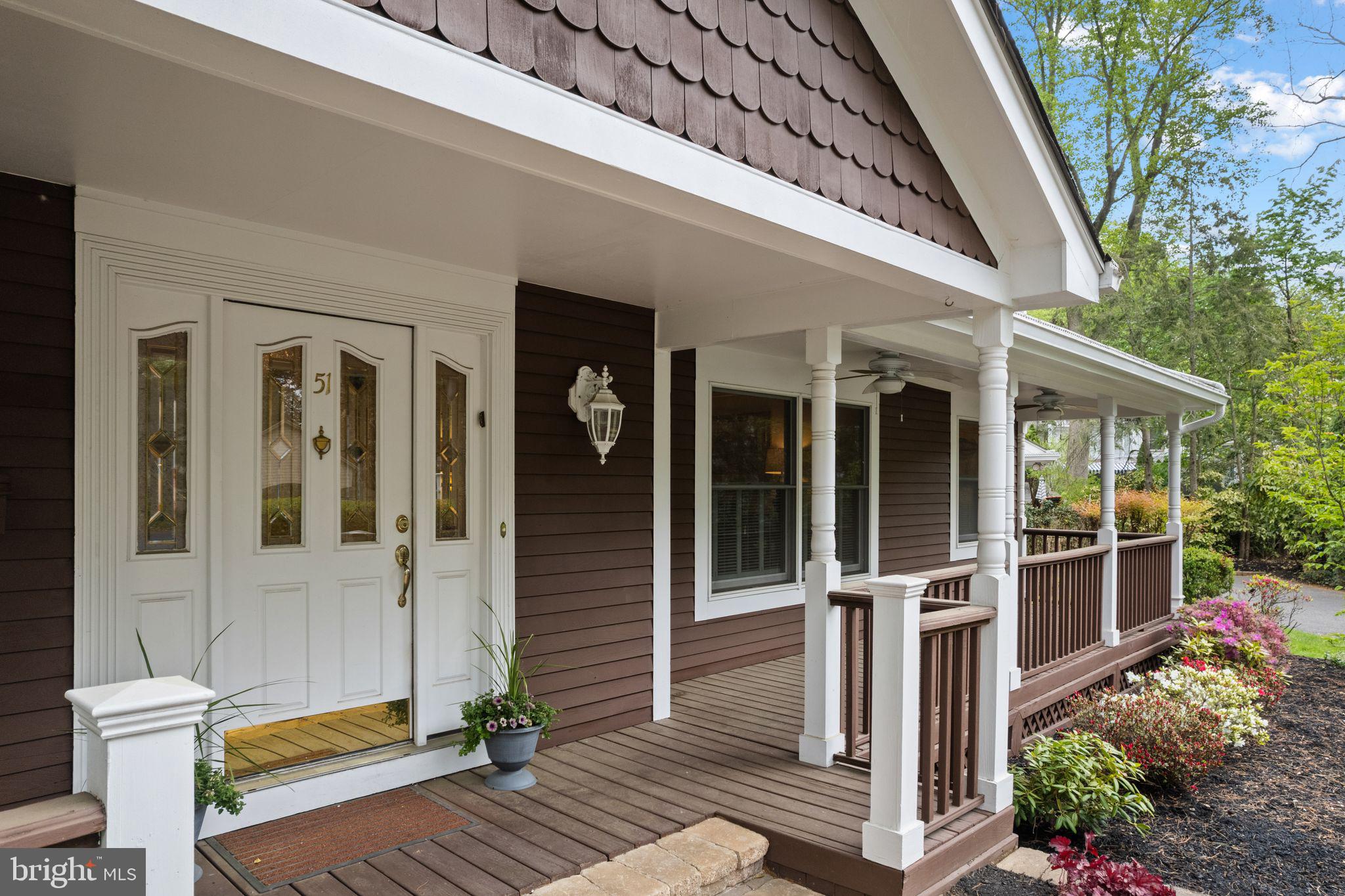 51 Chestnut Street Haddonfield, NJ 08033 - Photo 45 of 56 a front view of a house with glass windows and door