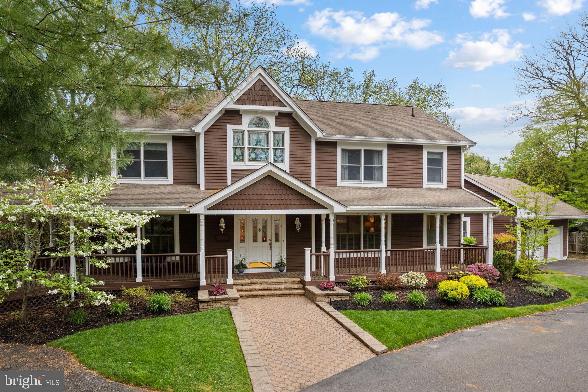 51 Chestnut Street Haddonfield, NJ 08033 - Photo 5 of 56 a front view of a house with a yard
