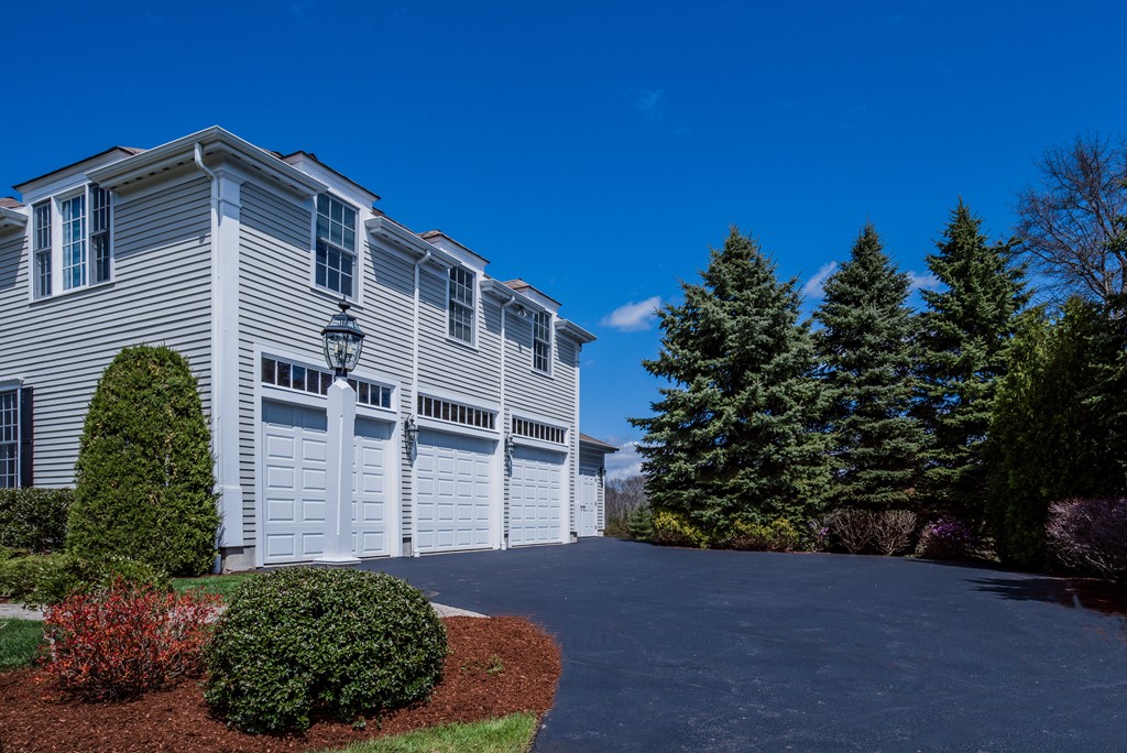 32 Fieldstone Farm Road Sudbury, MA 01776 - Photo 29 of 30 a front view of a house with a yard
