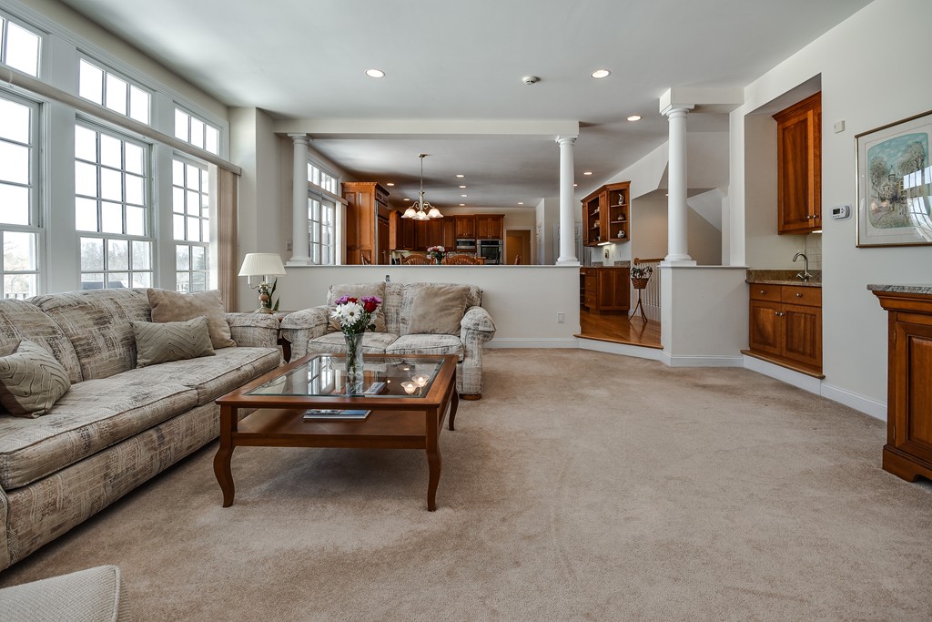32 Fieldstone Farm Road Sudbury, MA 01776 - Photo 8 of 30 a living room with furniture and a large window