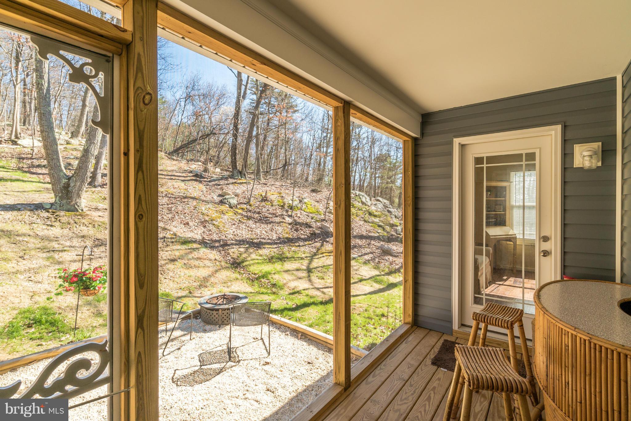 227 Markham Farm Road Front Royal, VA 22630 - Photo 22 of 25 Screened porch with access from master