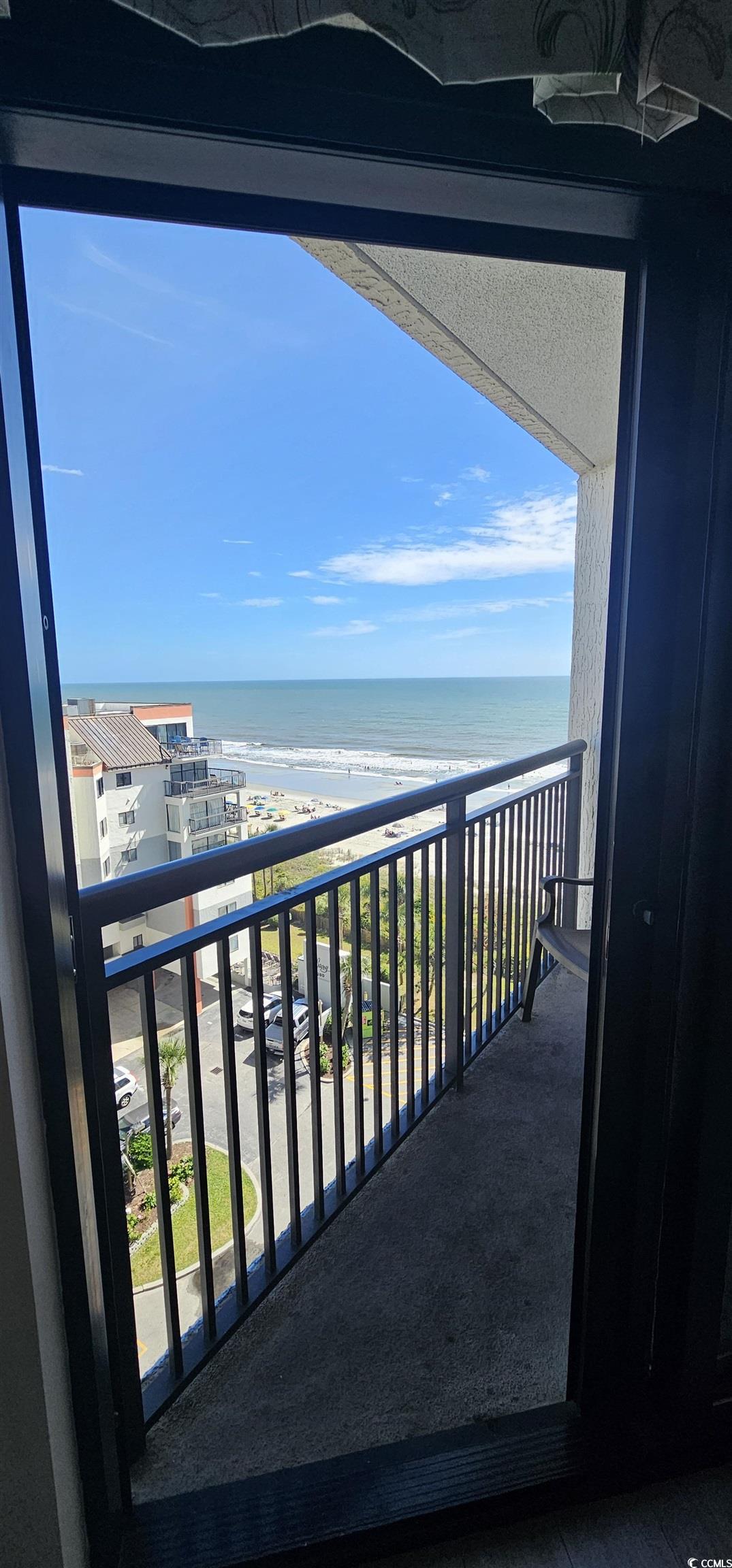 7100 North Ocean Boulevard, Unit 724 Myrtle Beach, SC 29572 - Photo 14 of 16 Balcony with view of water and beach