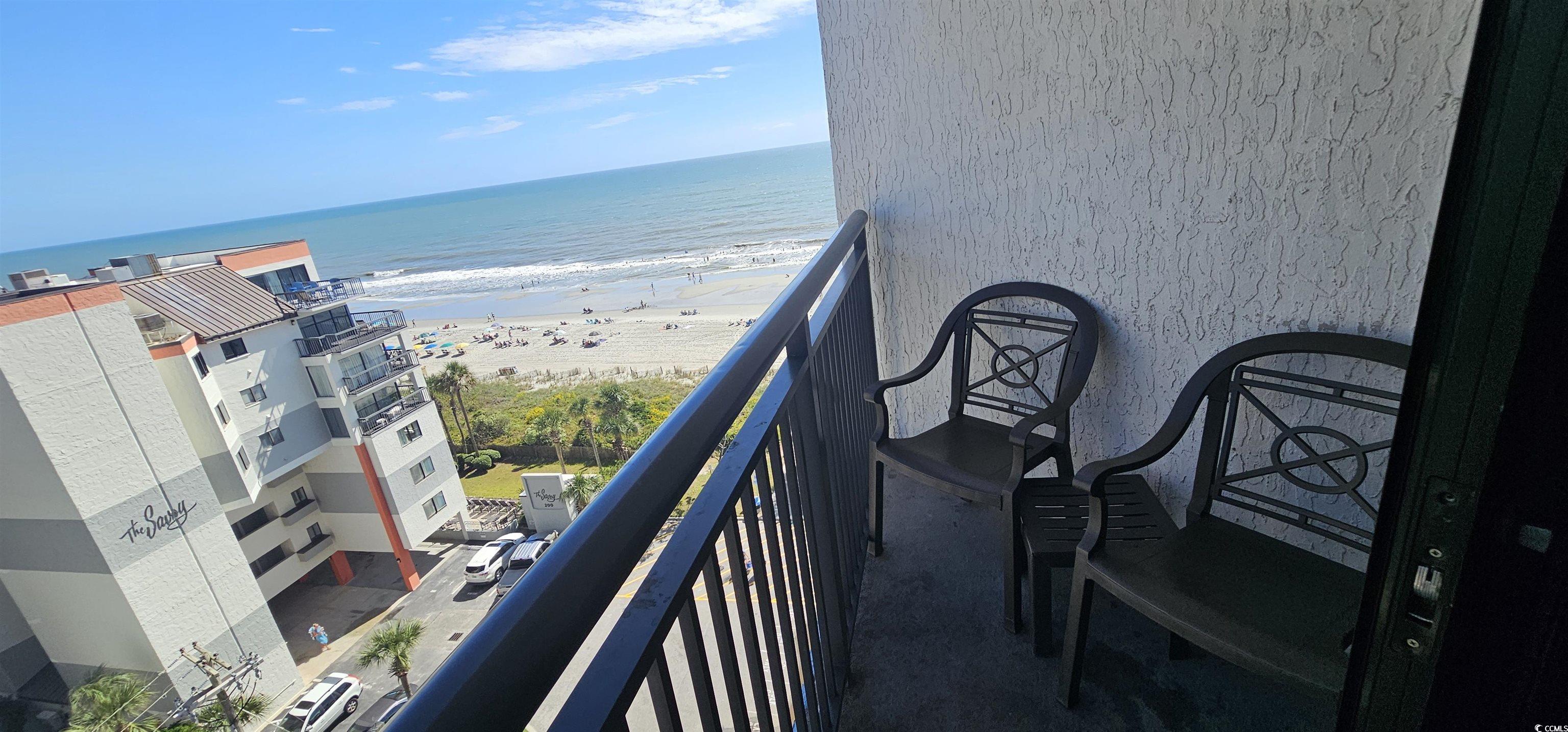 7100 North Ocean Boulevard, Unit 724 Myrtle Beach, SC 29572 - Photo 15 of 16 Balcony with view of water and beach