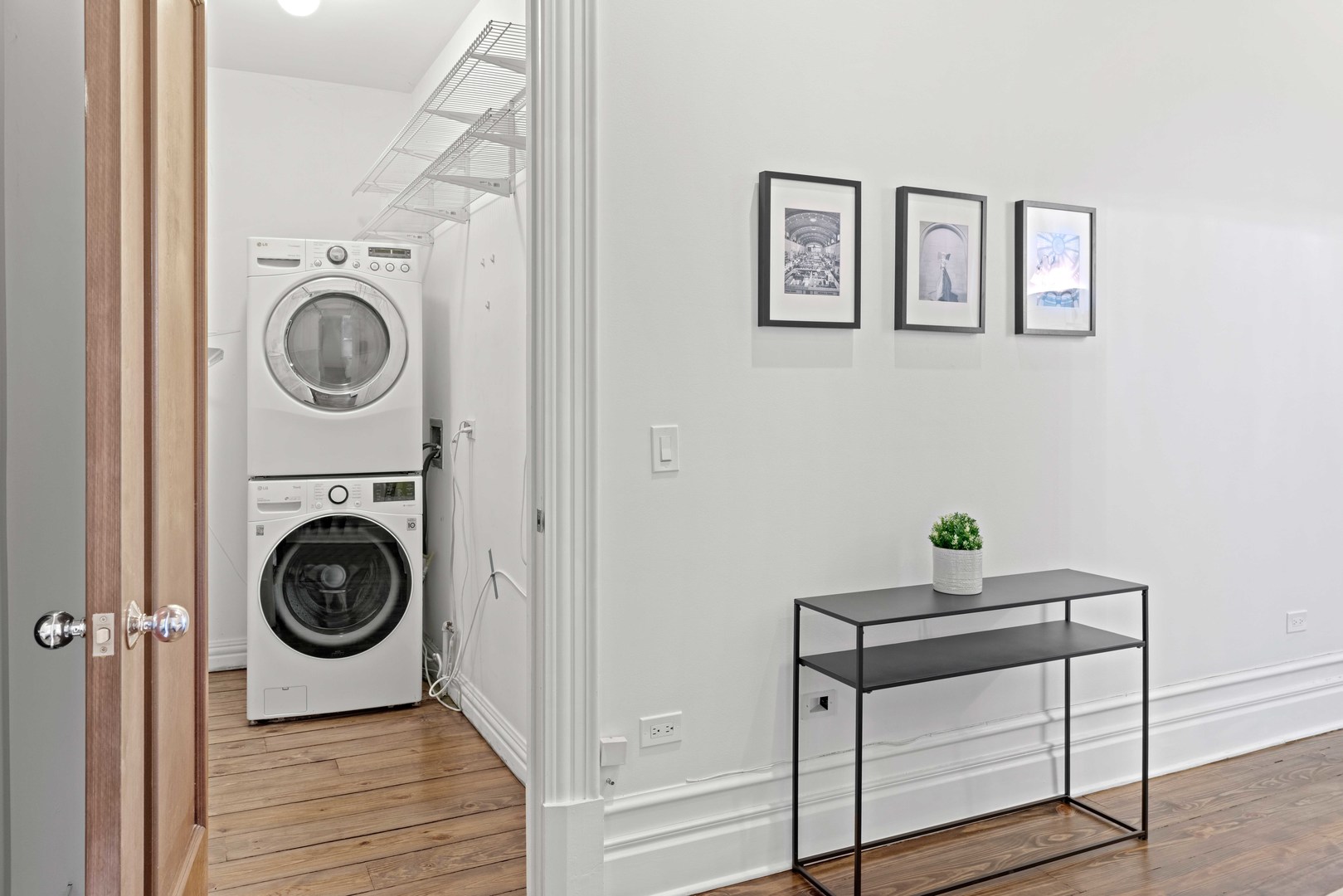 1400 West Chestnut Street, Unit 1 Chicago, IL 60642 - Photo 17 of 24 a view of a hallway with washer and dryer
