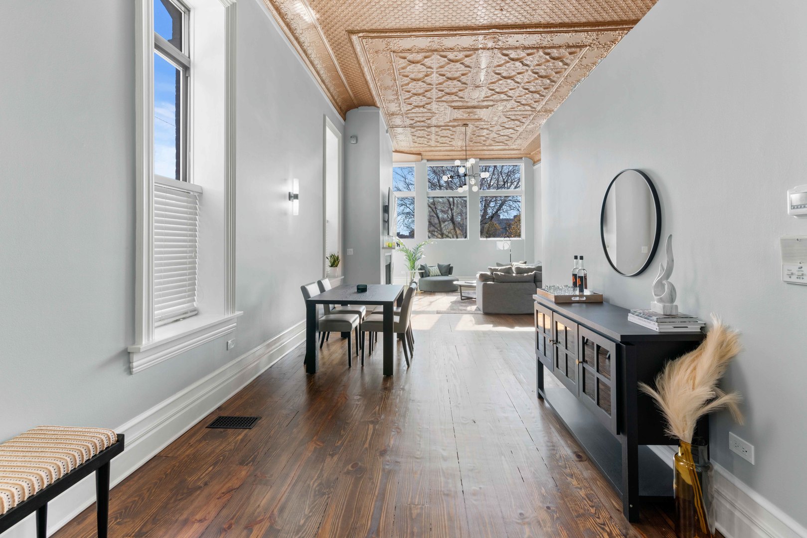 1400 West Chestnut Street, Unit 1 Chicago, IL 60642 - Photo 6 of 24 a living room with furniture a window entryway and wooden floor