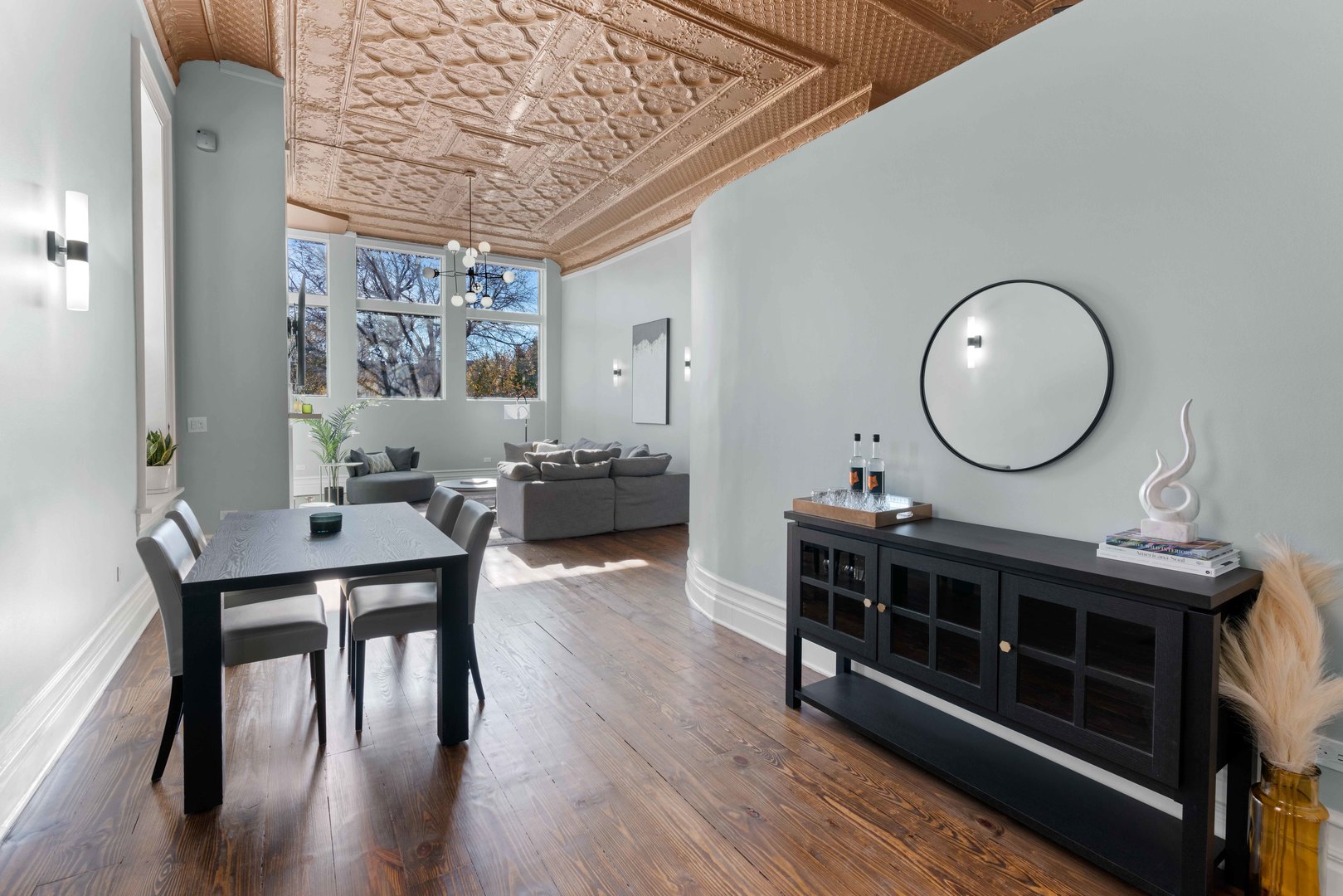 1400 West Chestnut Street, Unit 1 Chicago, IL 60642 - Photo 7 of 24 a view of a dining room with furniture and wooden floor