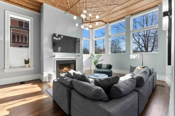 a large bed sitting in a bedroom next to a bathroom