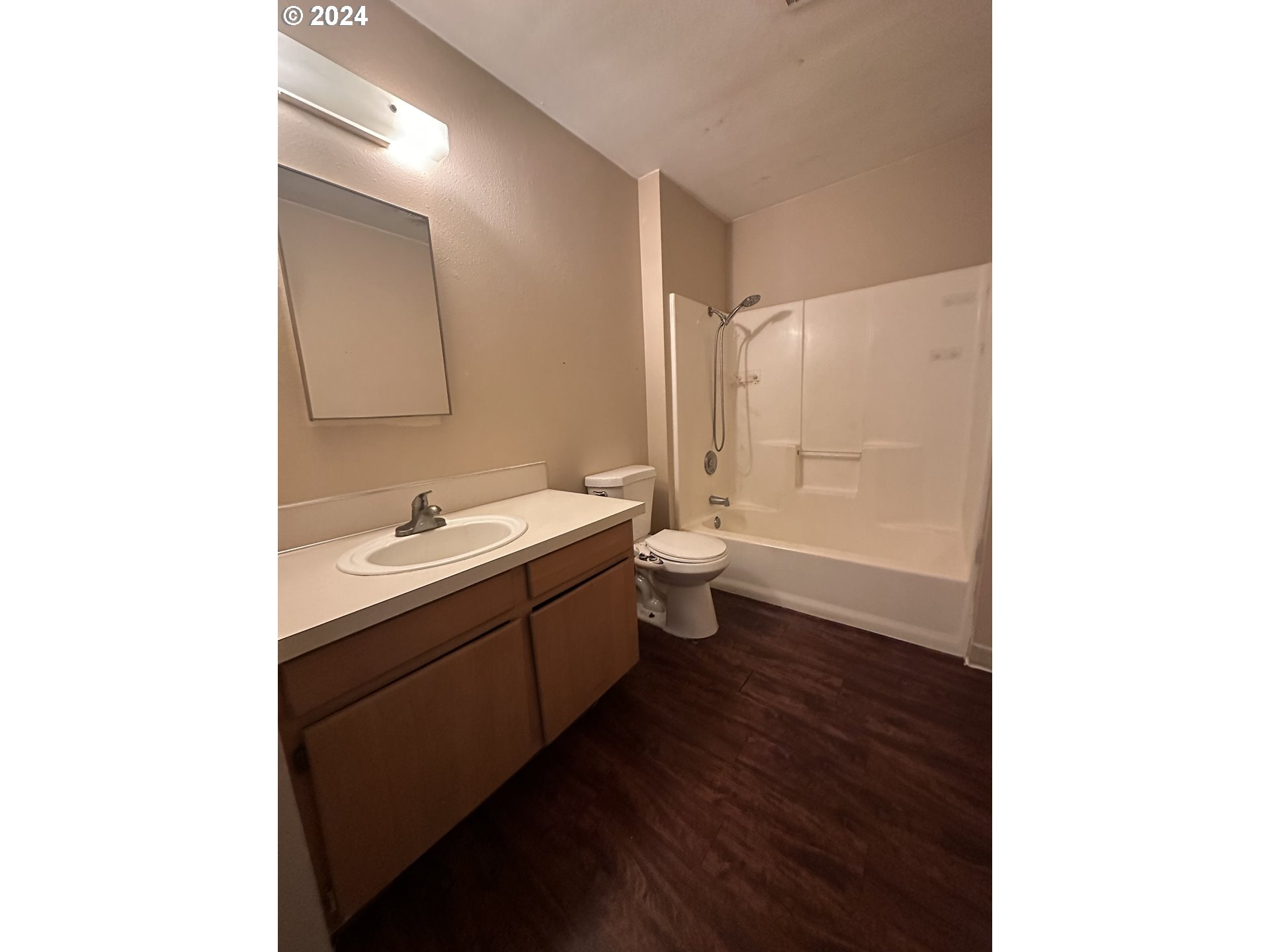 906-908 Pioneer Street Ridgefield, WA 98642 - Photo 16 of 19 a bathroom with a sink and a mirror