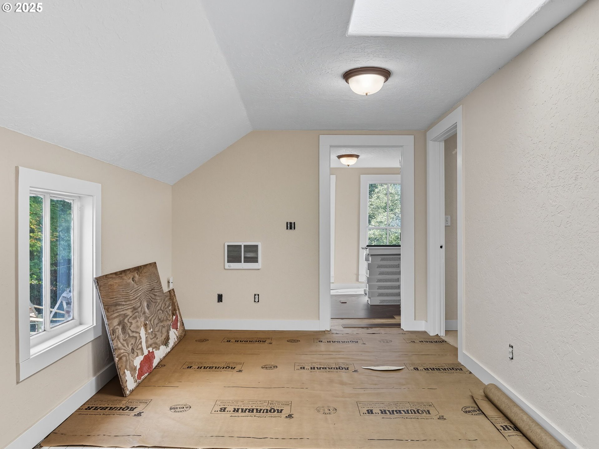 686 29th Street Astoria, OR 97103 - Photo 12 of 48 an empty room with windows and wardrobe