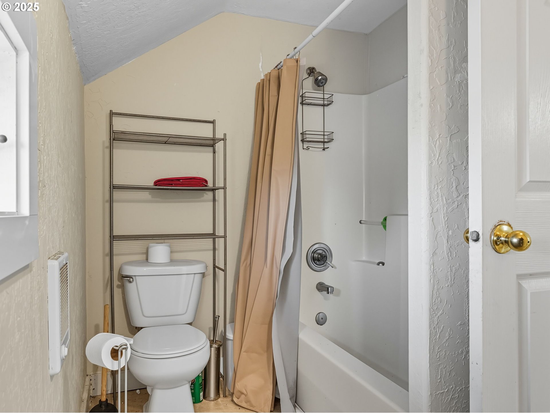 686 29th Street Astoria, OR 97103 - Photo 18 of 48 a bathroom with a toilet and a shower
