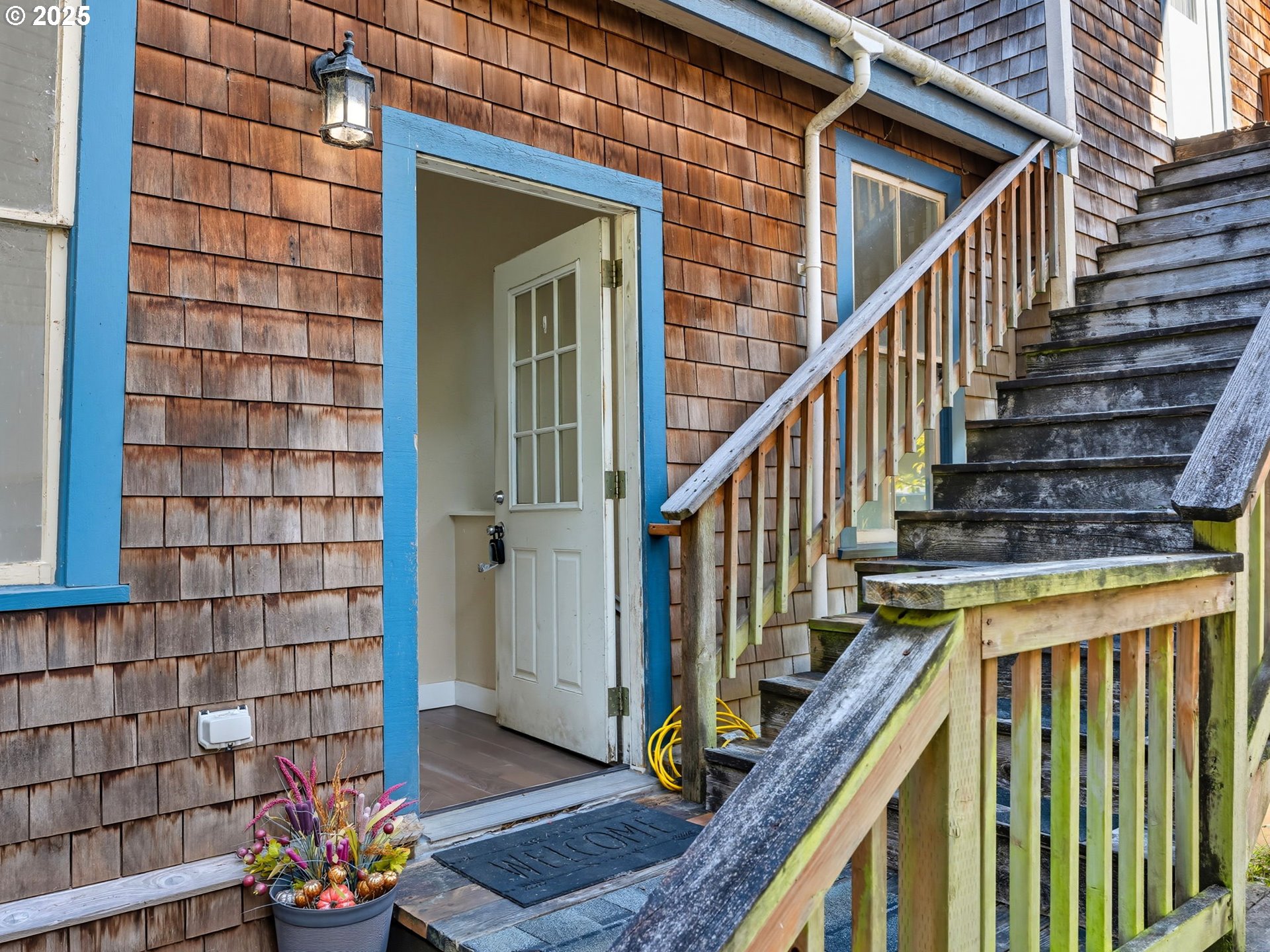 686 29th Street Astoria, OR 97103 - Photo 19 of 48 a view of entryway with wooden floor and a front door